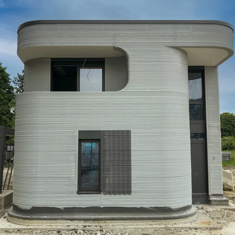 Дом 3D-принтера в Беккуме. Первый в Германии односемейный дом, построенный с использованием процесса 3D-печати бетона, находится в Беккуме в регионе Мюнстерланд.