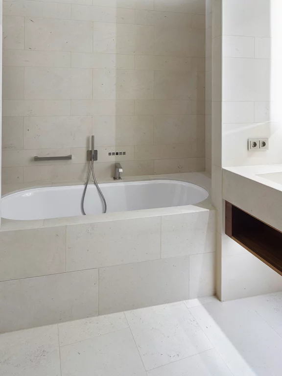 Built-in BetteStarlet Flair Oval bathtub, Hotel The Fontenay, Hamburg. The BetteStarlet Flair Oval bathtub set in natural stone in one of the bathrooms of The Fontenay Hotel, Hamburg.