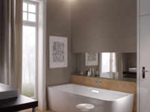 Freistehende, rechteckige Badewanne aus Stahl-Email, daneben Waschbecken auf dunkler Einbauplatte, modernes Badezimmer.