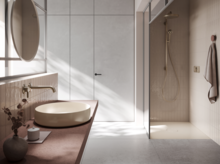 Waschbecken auf Einbauplatte, rund, daneben bodenebene, rechteckige Duschwanne aus Stahl-Email in modernem Badezimmer.