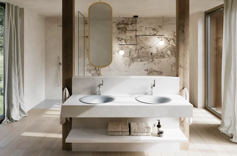 Bright bathroom with two light grey washbasins, silver-coloured taps, a large mirror and floor-to-ceiling windows.