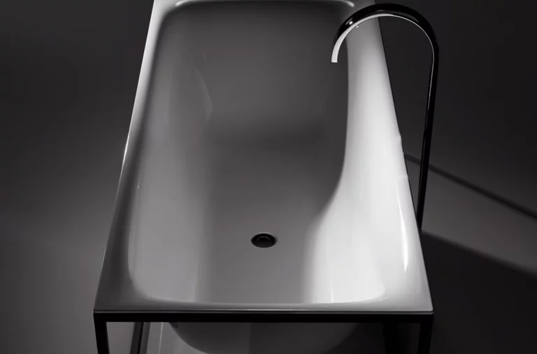 Rectangular steel enamel bathtub with rounded corners on a frame, modern freestanding faucet.