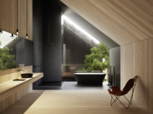 黑色淋浴底座与独立浴缸置于斜屋顶下，黑色洗手盆安放在木质台面上，窗外绿意盎然。