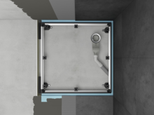 Universal installation system for shower trays with frame structure and drain connection on prepared floor.